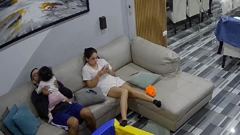 Baby Pulls Art Down Atop Parents