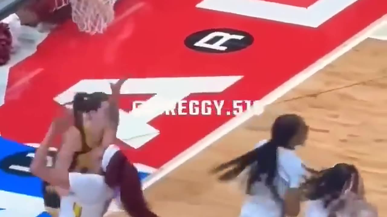 Caitlin Clark Out Smarts Her Defender for a Layup