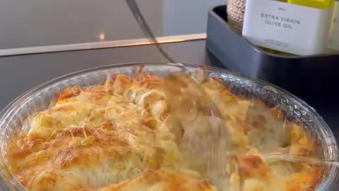 Creamy chicken breast and potato cubes with salad