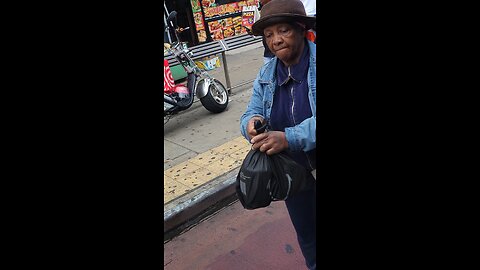 Negropeans eldery female doing the clothing of the mouth, floding of her lips. #Thebesilencetheme!