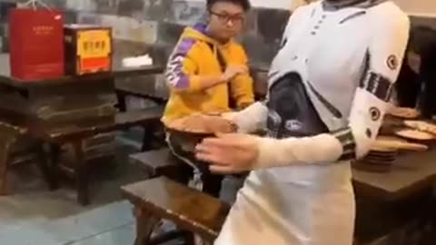 A Robotic Waiter Serves Food at a Chongqing Hotpot Restaurant in China! #chinarobots