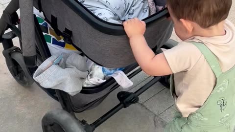 Mischievous Tot Trips Brake on Baby Sister's Stroller