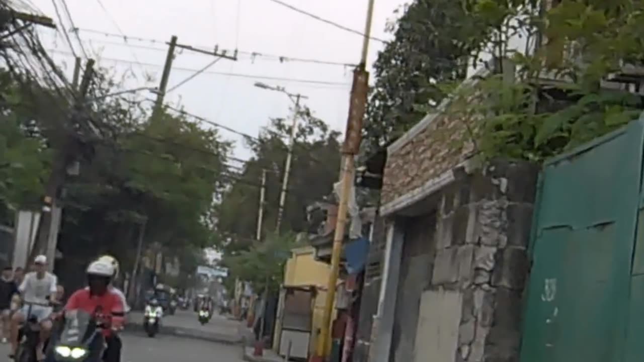 Pedestrian on Gov. Pascual Street in Navotas City in the Philippines