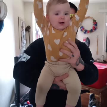 Daisy Raines doing some assisted pullups