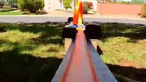 Guy built hotwheels racetrack through and around his house