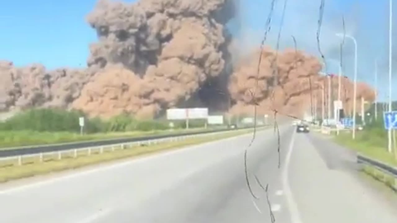 Shockwave travel time visible through the windshield.