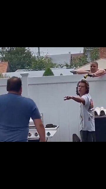 Neighbor sprays hose on family cookout because its a fire hazard
