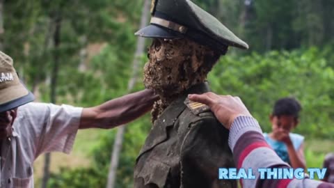 Warning Graphic: Villagers dig up their ancestors and dress them for ancient ritual