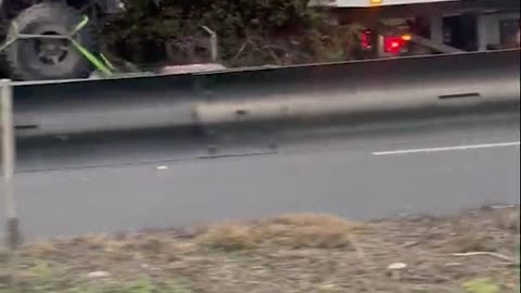 Baby and Parent Car Getting Towed