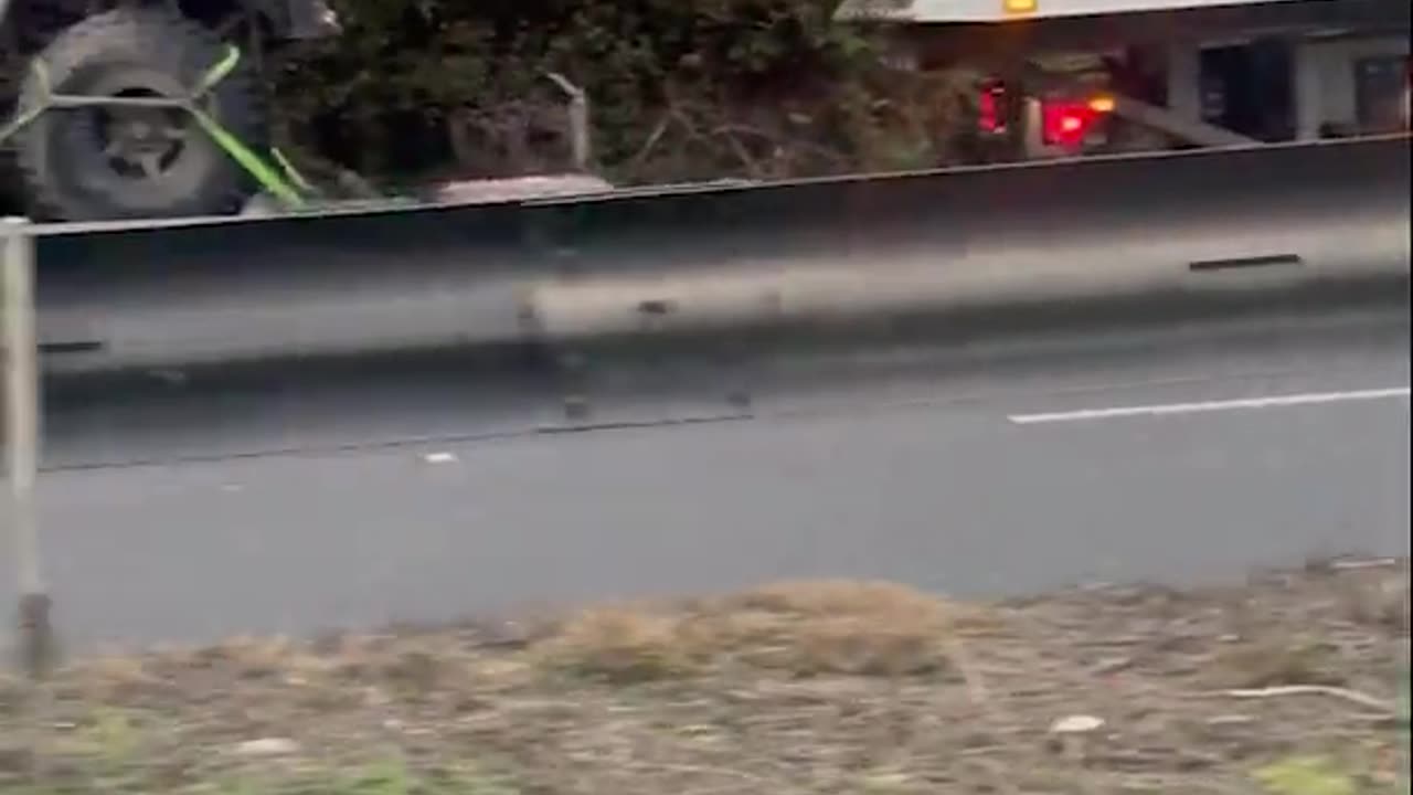 Baby and Parent Car Getting Towed