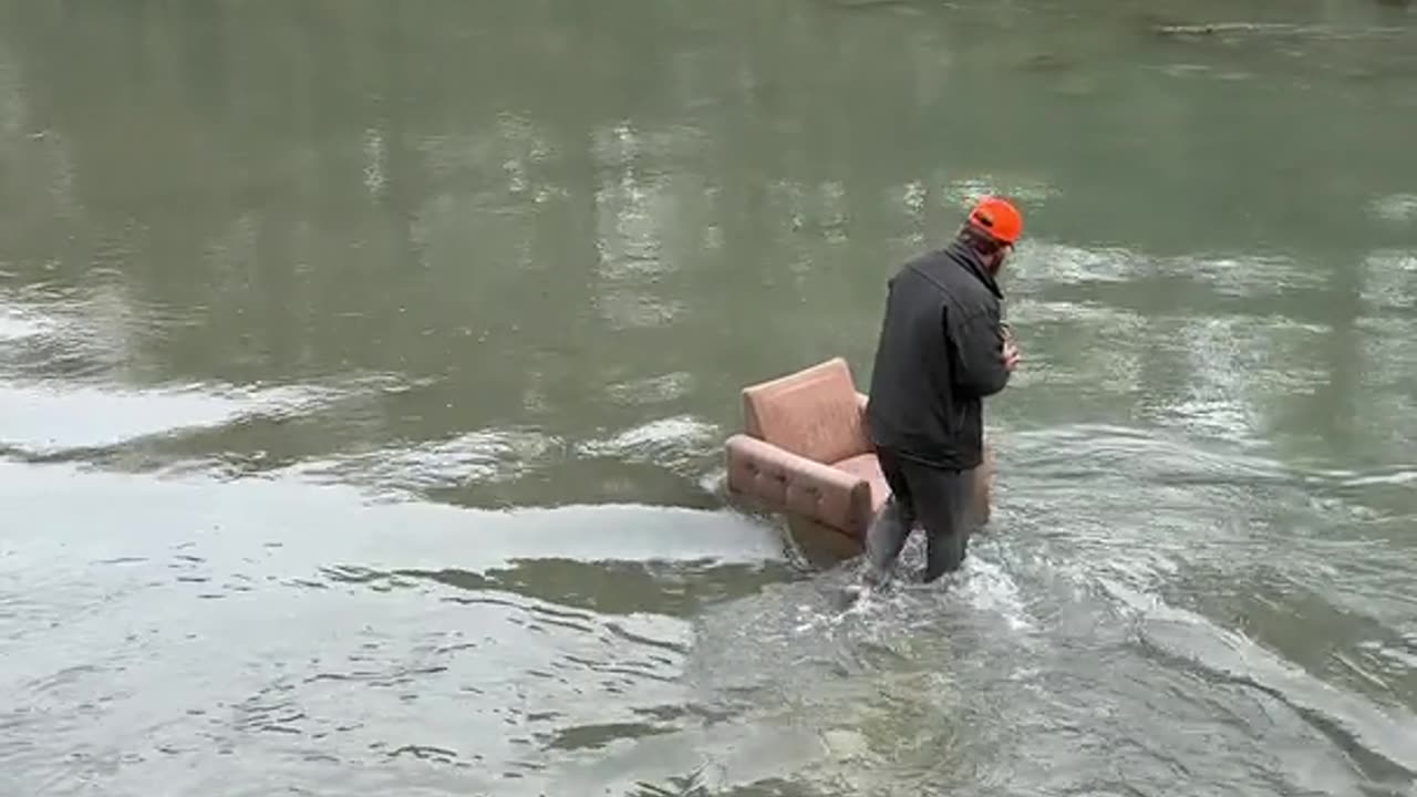 Man Turns River Fall Into Photo Op