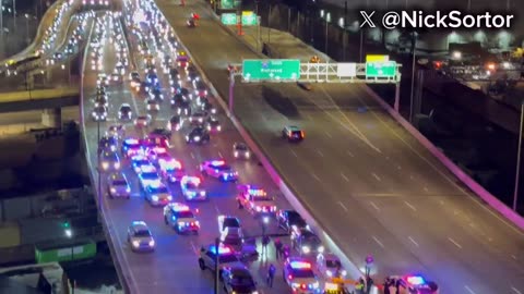 Officer down as police and National Guard flood I-695 near the U.S. Capitol.