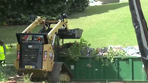 This decaying homeless encampment is currently being cleared and cleaned up in Washington, D.C.