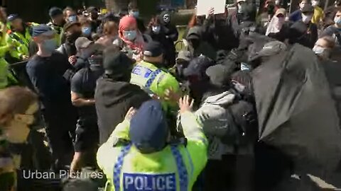 Clashes in Manchester as masked-up counter-protesters try to block Britain First from marching