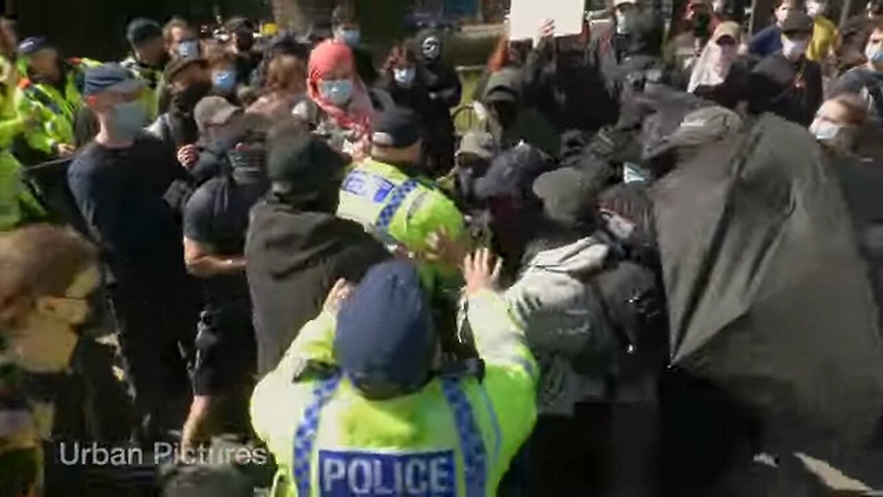 Clashes in Manchester as masked-up counter-protesters try to block Britain First from marching