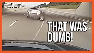 Watch Car Thief Desperately Try to Escape Grappling Device
