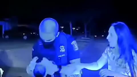 A Michigan cop pulled over a reckless driver and ended up saving a choking baby