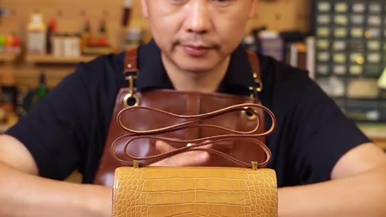 Making bags from crocodile skin