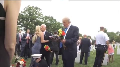 President Trump shares a heartfelt moment with 6-year-old Christian Jacobs at the grave of his father Marine Sgt. Christopher Jacobs