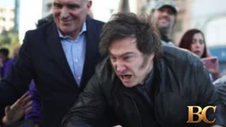 Milei evacuated from campaign event after stone attack