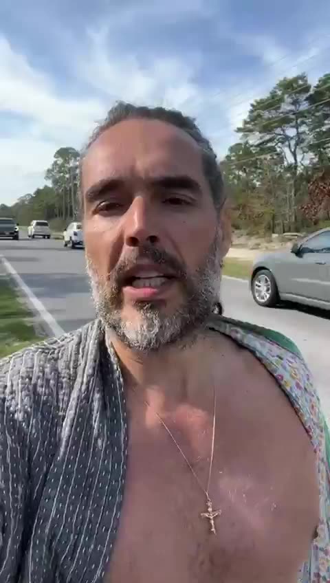 Hitchhiking Russell Brand Gets Picked Up By Family, Given 'Holy Water' to Drink