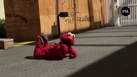 Someone in an Elmo Costume Trolled Antifa at the ICE Facility in Portland