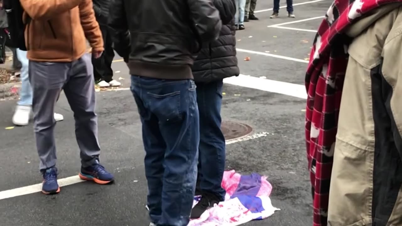 PROTESTERS TRAMPLE ON ISRAELI FLAG