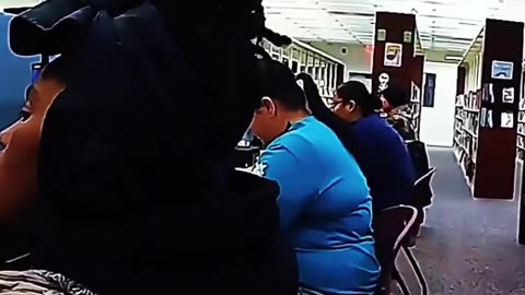 Woman with serious attitude thrown out of library