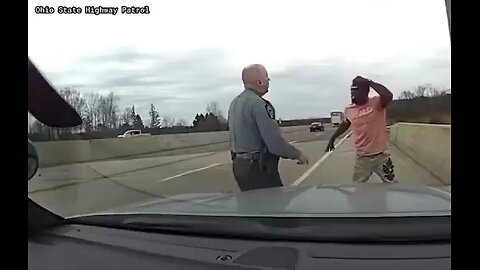 Black community leader attacks police officer screaming in the name of Jesus