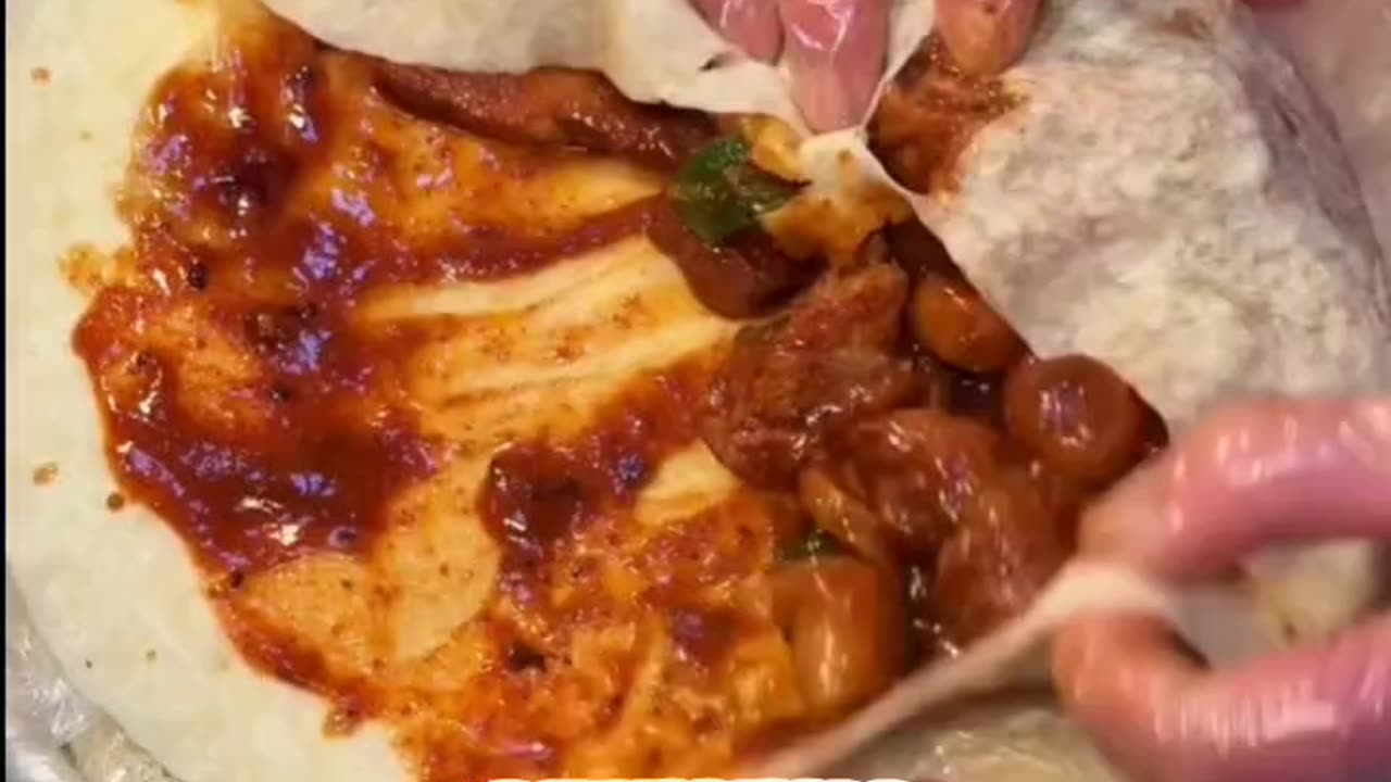 Bunch of meats stuffed in one wrap of tortilla, black sesame toast
