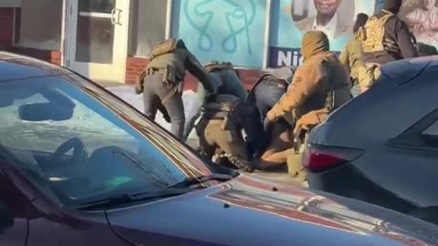 Federal Agents Shoot Armed Man in Minneapolis