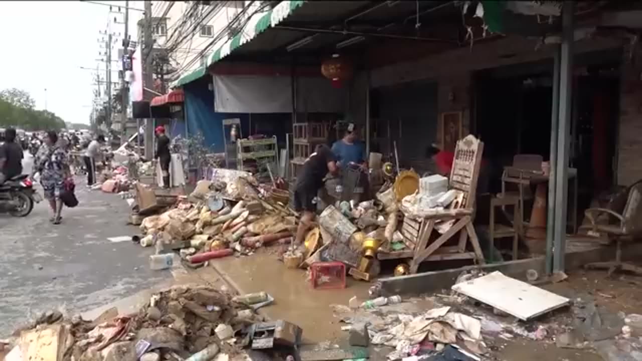 Rescuers struggle to find survivors after devastating floods and landslides