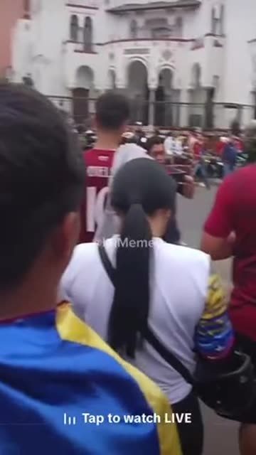Venezuelans are flooding the streets, draped in and waving their national flags, celebrating