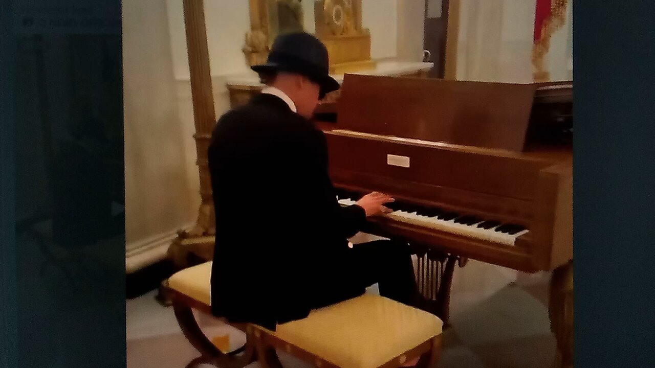 Kid Rock playing piano at WH