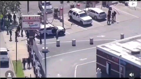 Sh00ting over a woman at a car wash...