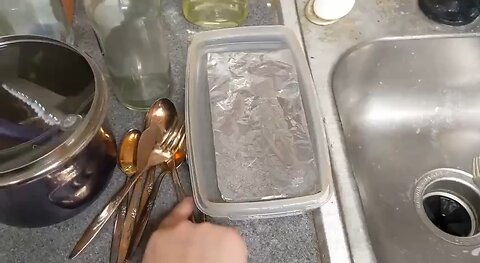 Clean silver using common household items: hot water, baking soda, salt, and an aluminum foil.