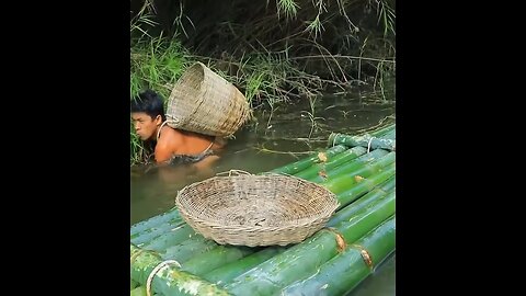 My Vietnamese cousin caught a large basket of shrimps in the wild river and grilled them with