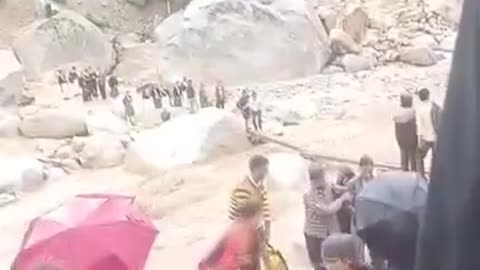 Caught on Camera: Woman Falls into Raging Drain in India — Narrow Escap