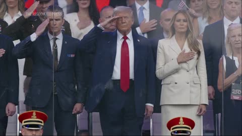 President Donald Trump arrives on stage for military parade