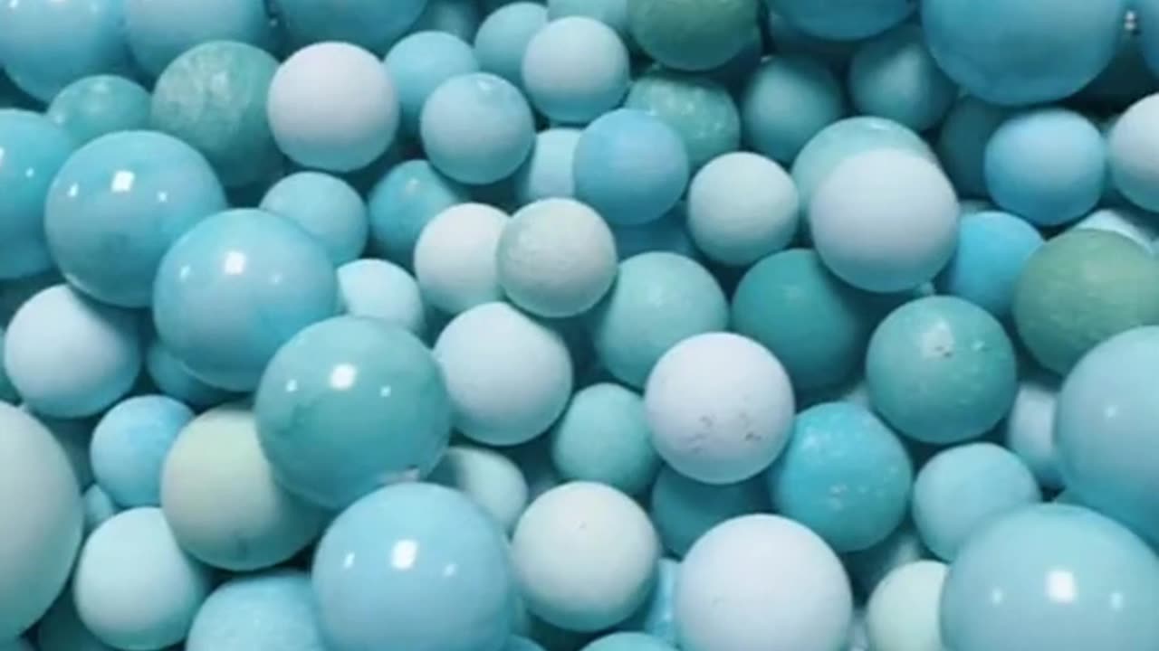 250430-10 Natural turquoise beads, hand polished to a round shape.