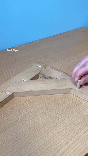 Close-up of Electric Drill Working on Wood Board