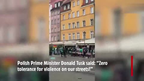 Moment Chelsea & Real Betis fans CLASH in Poland launching chairs & smoke grenades