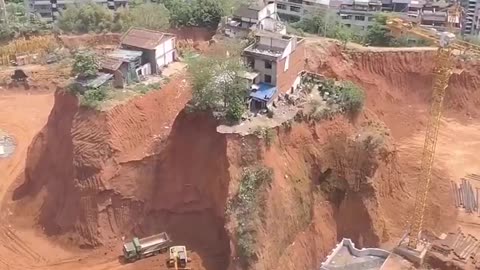 THESE ARE AN EXAMPLE OF WHAT IN CHINA IS CALLED A ‘NAIL HOUSE(DINGZIHU)