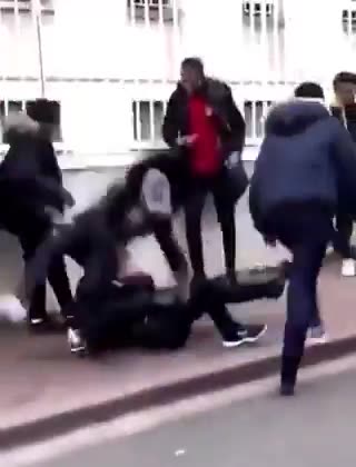 A group of blacks jumping white man in Europe........again