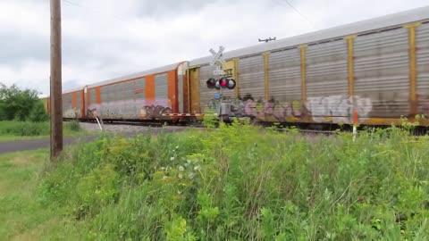 CSX Auto Rack Train with a caboose