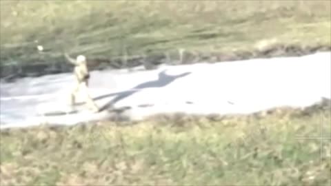 Russian Soldier Tries Swatting Away Drone