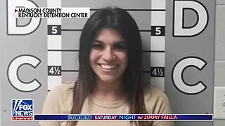 Ex beams in viral mugshot after DESTROYING boyfriend’s car