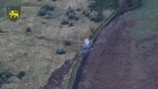Ukrainian Drone Finds Fully Loaded Russian APC Hiding in the Bushes