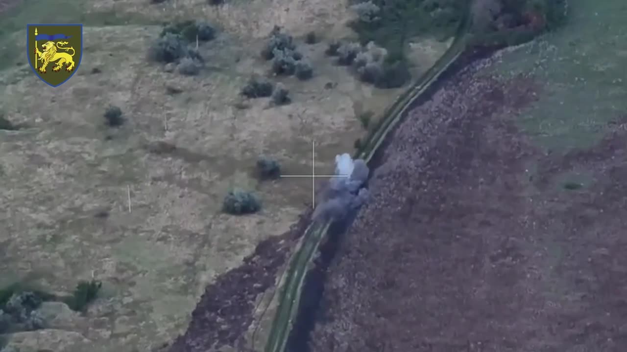 Ukrainian Drone Finds Fully Loaded Russian APC Hiding in the Bushes