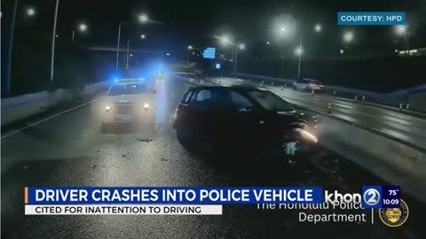 Car slams into HPD vehicle on roadway, driver cited 30